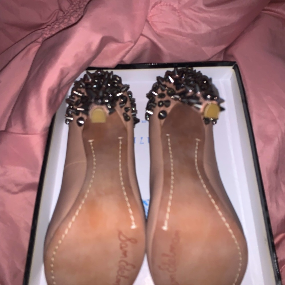Open toed spiked pumps